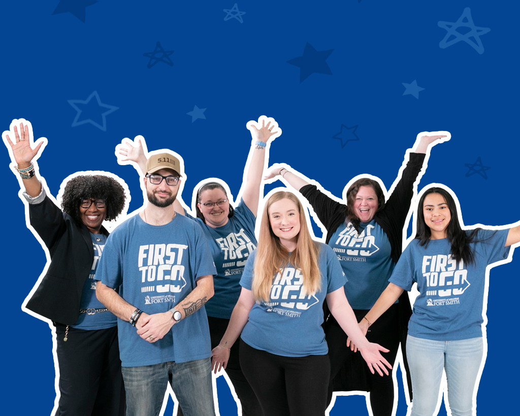 Students wearing first-to-go tees celebrate