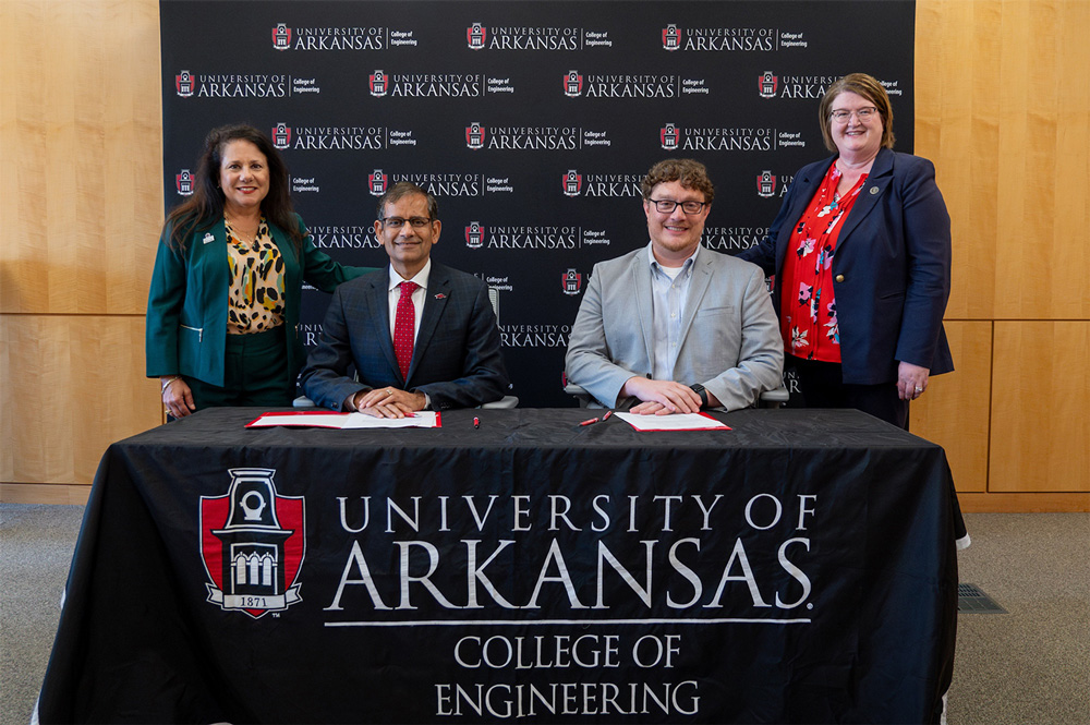 From left to right: Dean Kim Needy and Provost Indrajeet Chaubey from the University of Arkansas sit next to Dr. Shadow Robinson, provost and vice chancellor of academic affairs, and Latisha Settlage, dean for the College of Business and Industry, sign engineering partnership renewal between the two universities,