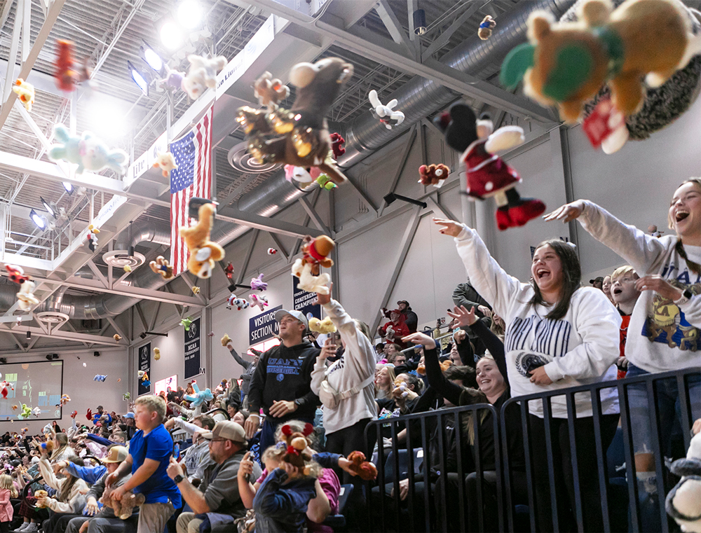 Dozens of toys are thrown onto the court of the Stubblefield Center during annual UAFS Toy Toss